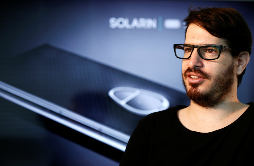  Moshe Hogeg, co-founder and president of British-Israeli start-up, Sirin Labs AG, manufacturers of Solarin, a mobile device with unprecedented levels of technology and security, speaks during an interview with Reuters at their offices in Tel Aviv, Israel May 16, 2016 (credit: AMIR COHEN/REUTERS)
