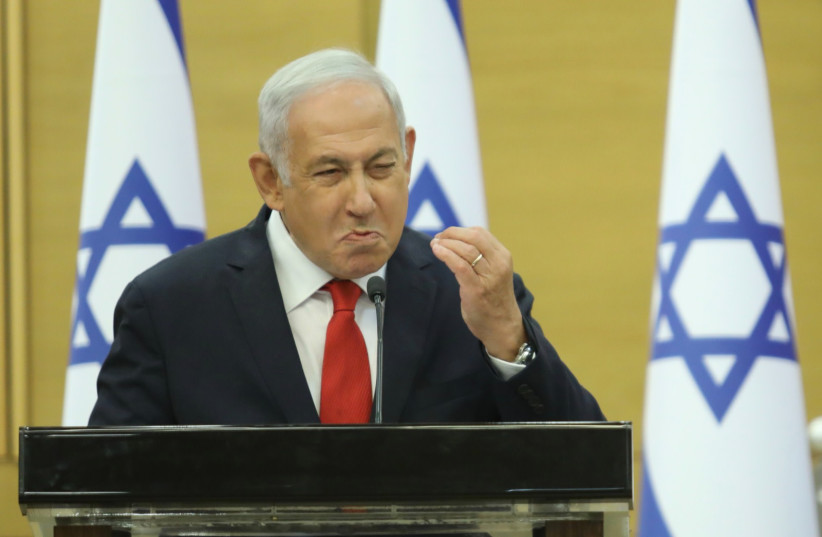  Opposition head Benjamin Netanyahu at the Knesset, November 8, 2021. (photo credit: MARC ISRAEL SELLEM/THE JERUSALEM POST)