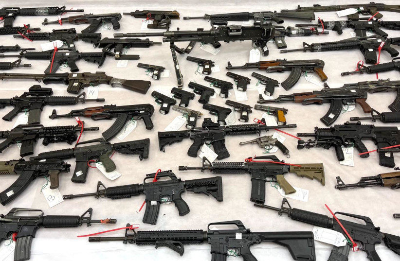 A collection of illegal firearms are seen after being seized by the Israel Police. (photo credit: POLICE SPOKESPERSON'S UNIT)
