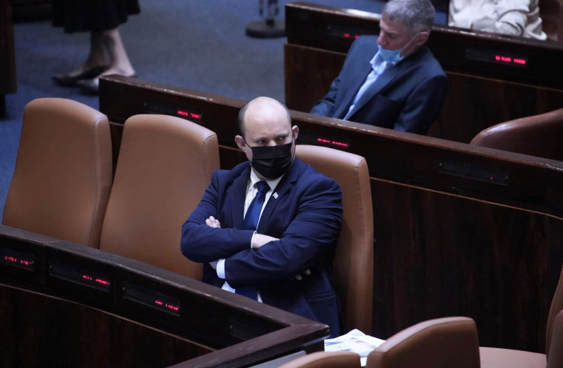  Prime Minister Naftali Bennett following the passing of the preliminary reading of a bill (credit: DANNY SHEMTOV/KNESSET SPOKESPERSON'S OFFICE)