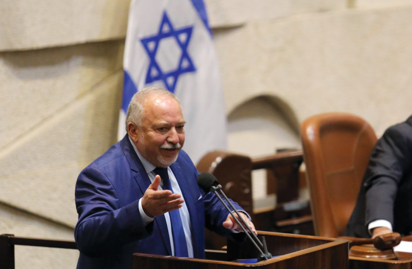  Finance Minister Avigdor Liberman defends the budget in a Knesset address. (credit: MARC ISRAEL SELLEM)