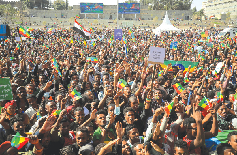 ETHIOPIANS ATTEND a pro-government rally to denounce what the organizers say is the Tigray People’s Liberation Front (TPLF) and the Western countries’ interference in internal affairs of the country, at Meskel Square in Addis Ababa, earlier this week. (credit: Tiksa Negeri/Reuters)