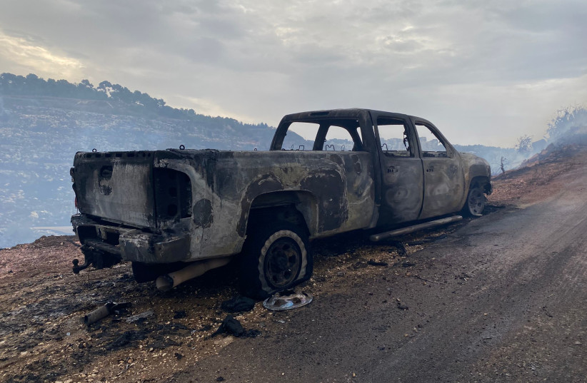  A vehicle burnt in a fire near Ma'alot Tarshiha on November 14, 2021. (credit: FIRE AND RESCUE AUTHORITY NORTHERN DIVISION)