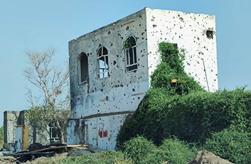  A view of a building damaged by clashes is seen on the outskirts of the Red Sea port city of Hodeidah, Yemen November 13, 2021.  (credit: REUTERS/MANAL QAED)