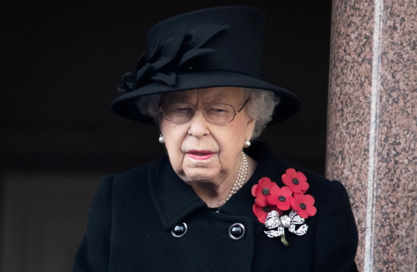  Britain's Queen Elizabeth attends the National Service of Remembrance at The Cenotaph on Whitehall in London, Britain November 8, 2020. (photo credit: AARON CHOWN/PA WIRE/POOL VIA REUTERS/FILE PHOTO/FILE PHOTO)