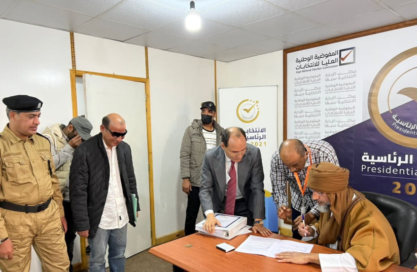  Saif al-Islam al-Gaddafi, son of Libya's former leader Muammar al-Gaddafi, registers as a presidential candidate for the December 24 election, at the registration centre in the southern town of Sebha, Libya November 14, 2020.  (photo credit: KHALED AL-ZAIDY/HANDOUT VIA REUTERS)