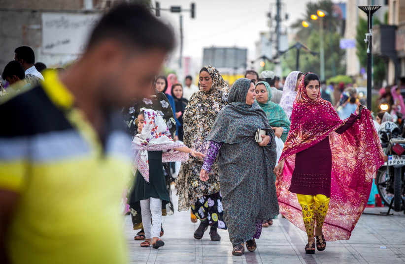 People walk in the street at Bandar Abbas, Iran August 22, 2019. Picture taken August 22, 2019. (credit: NAZANIN TABATABAEE/WANA (WEST ASIA NEWS AGENCY) VIA REUTERS)