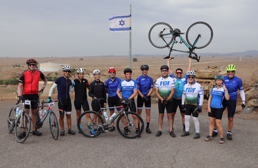  FIDF supporters and wounded IDF veterans following the sixth annual FIDF ride (photo credit: GILAD KAVALERCHIK)