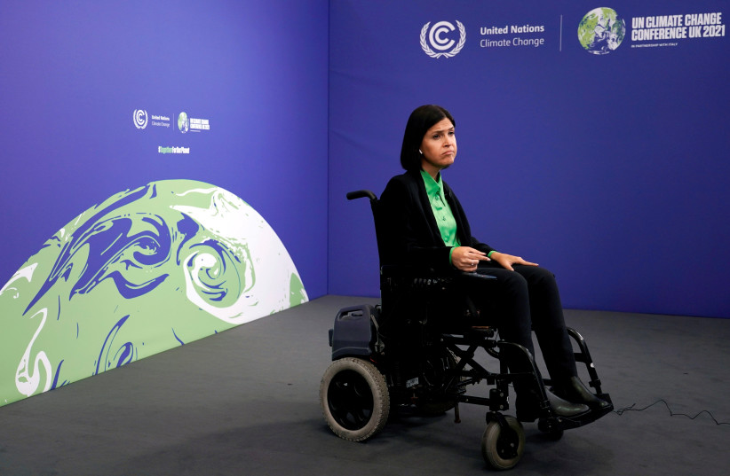 Israel's Energy Minister Karine Elharrar waits for the start of a meeting during the UN Climate Change Conference (COP26) in Glasgow, Scotland, Britain, November 2, 2021.  (photo credit:  ALBERTO PEZZALI/POOL VIA REUTERS)