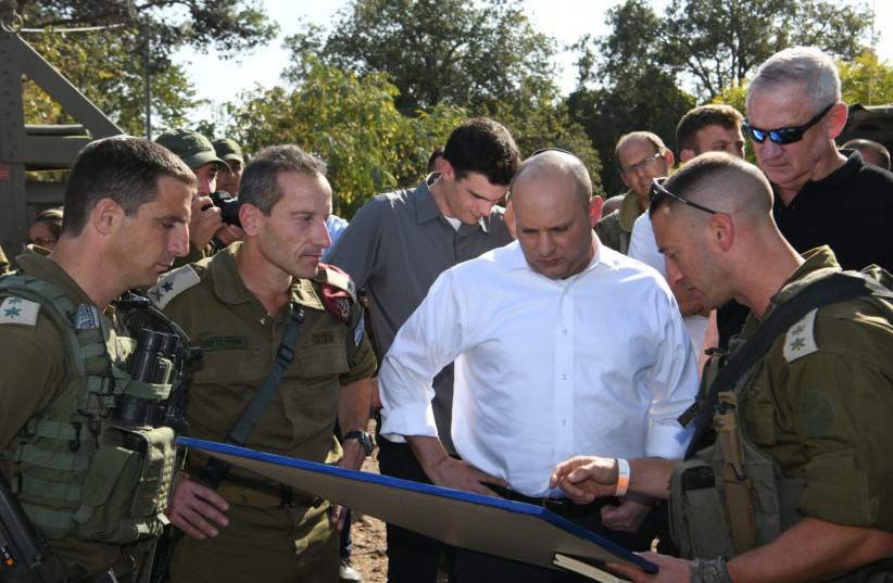  Prime Minister Naftali Bennett and Defense Minister Benny Gantz visit an IDF drill in northern Israel (photo credit: AMOS BEN GERSHOM/GPO)