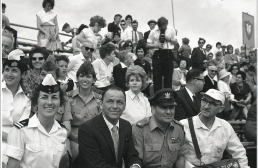  Frank Sinatra watching an IDF military parade, 1962.  (credit: BORIS CARMI, THE MEITAR COLLECTION)