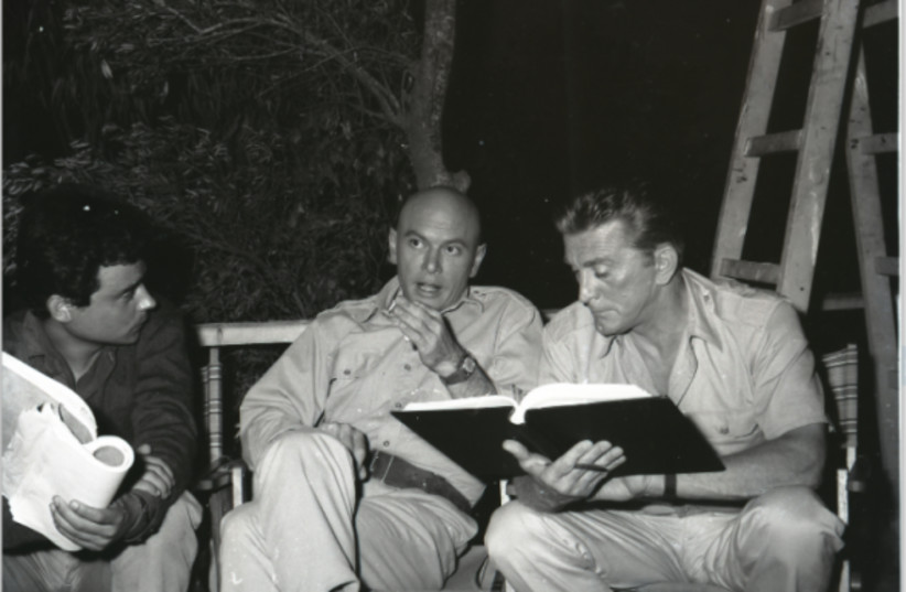  We could not find any documentation of the visit described above, so in place is a photo from an earlier one: Kirk Douglas and Yul Brynner on the set of Cast a Giant Shadow in Israel.  (credit: BORIS CARMI, THE MEITAR COLLECTION)
