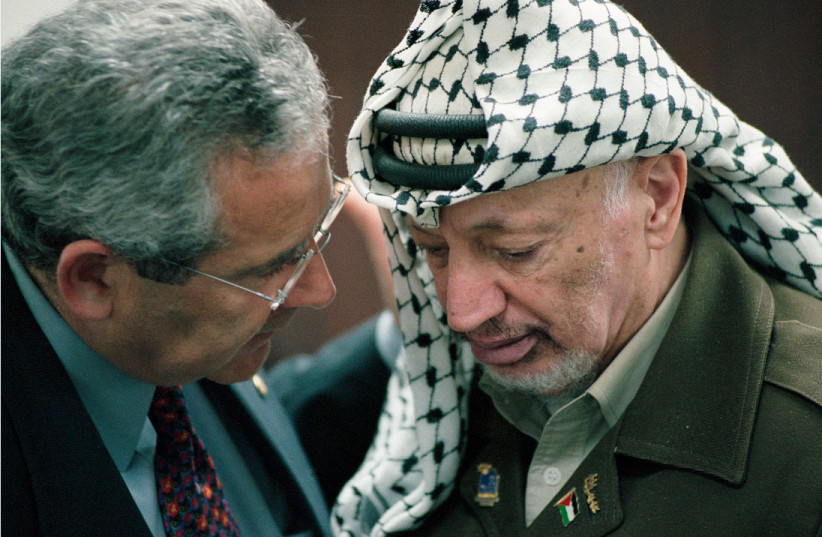  YASSER ARAFAT nose-to-nose with diplomat Gamal Helal.  (credit: MATTY STERN)