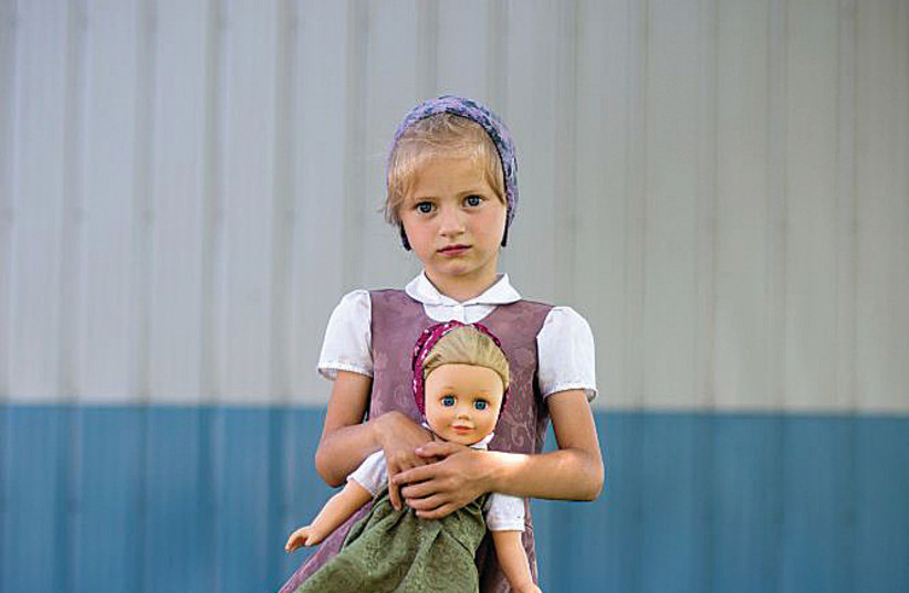  CANADIAN PHOTOGRAPHER Tim Smith has been following communities of Hutterites for 12 years. (credit: Courtesy)