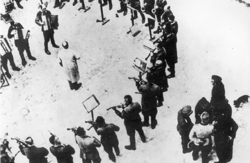  Inmates orchestra of Janowska Nazi concentration camp in Lviv, west Ukraine. 1941-1943. The orchestra played when the inmates departed for work and on their return. The orchestra was established by the Germans who amused themselves by mocking and humiliating the inmates. (credit: Wikimedia Commons)