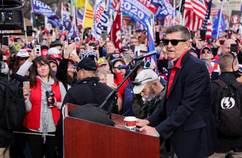 Former US national security adviser Michael Flynn speaks as supporters of US President Donald Trump listen during a rally to protest the results of the election in front of Supreme Court building, in Washington, US, December 12, 2020. (photo credit: REUTERS/JONATHAN ERNST)