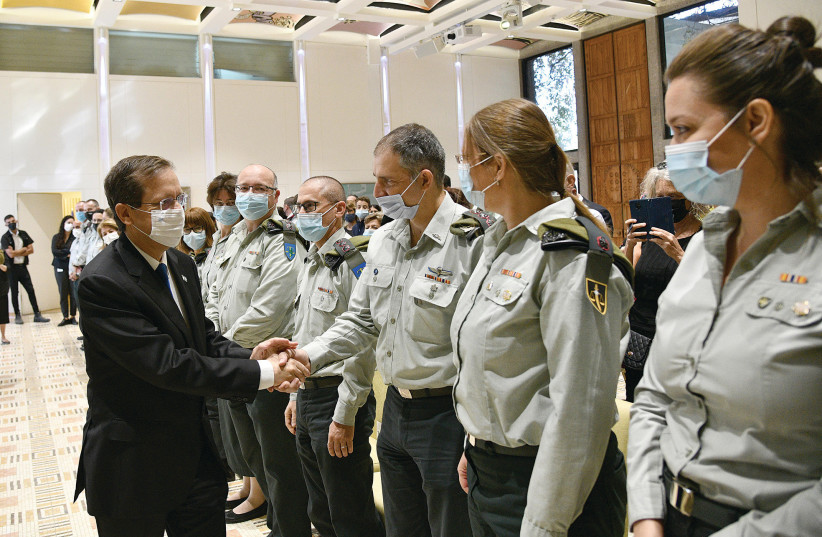  PRESIDENT ISAAC HERZOG congratulates new military judges  (photo credit: HAIM ZACH/GPO)