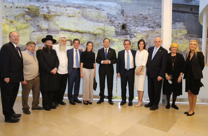  President Isaac Hertzog (center) attends the dedication of the ‘Western Wall Heritage Center’ (credit: WESTERN WALL HERITAGE FOUNDATION)