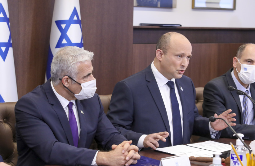   Prime Minister Naftali Bennett at the cabinet meeting, November 21, 2021. (credit: MARC ISRAEL SELLEM/THE JERUSALEM POST)