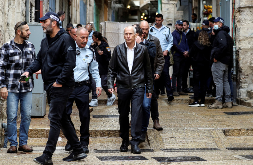  Omer Bar-Lev, Israel's Minister of Public Security walks with Israeli police officers at the site of a shooting incident in Jerusalem's Old City. (photo credit: REUTERS/AMMAR AWAD)