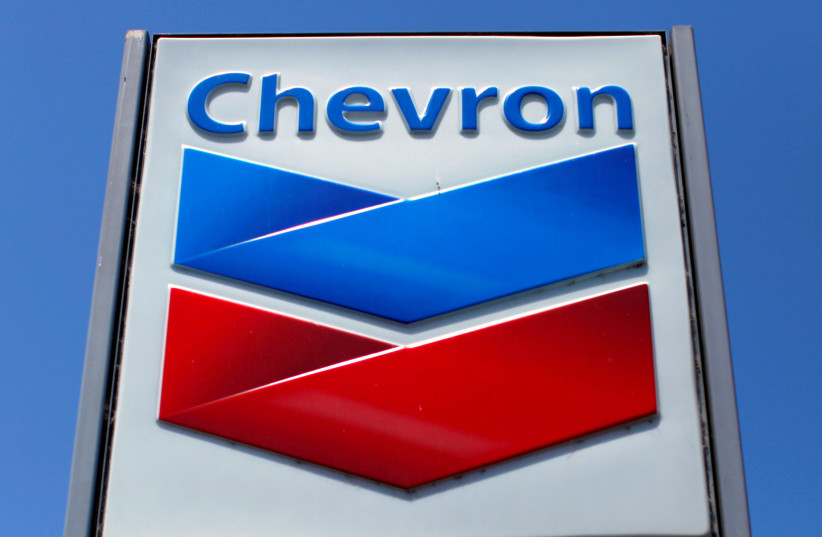  A Chevron gas station sign is seen in Del Mar, California, April 25, 2013. (credit: REUTERS/MIKE BLAKE/FILE PHOTO)