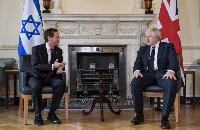  President Isaac Herzog meets with British PM Johnson in London on November 23, 2021.  (credit: KOBI GIDEON/GPO)