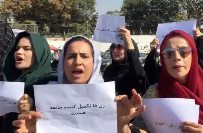  Women protest outside the Arg Presidential Office in Kabul, Afghanistan. (photo credit: AAMAJ NEWS AGENCY/via REUTERS)