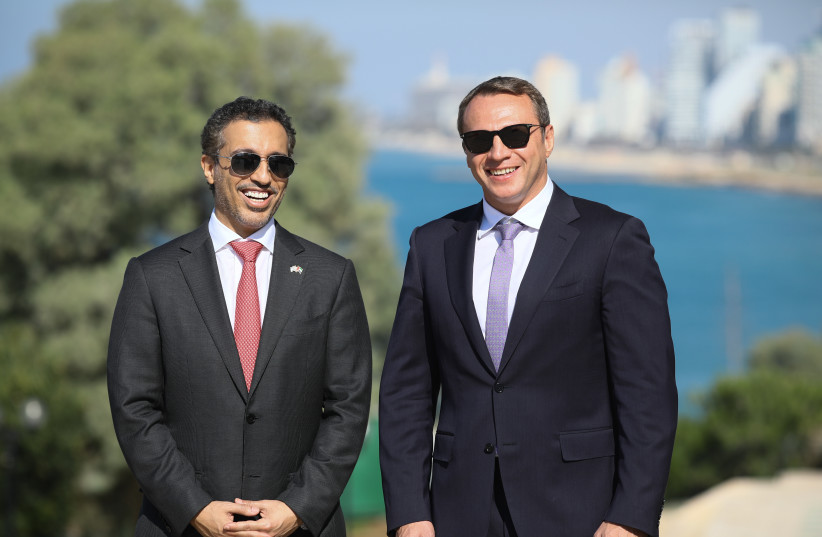 UAE Minister of State Entrepreneurship and SMEs Dr. Ahmad Belhoul Al Falasi (L) and Israeli Tourism Minister Yoel Razvozov stand at the observation deck in Jaffa. (photo credit: SIVAN SHACHOR)