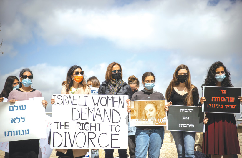  PROTESTERS OUTSIDE the Jerusalem Rabbinical Court demand a woman’s right to receive a divorce from an abusive husband.  (photo credit: YONATAN SINDEL/FLASH90)
