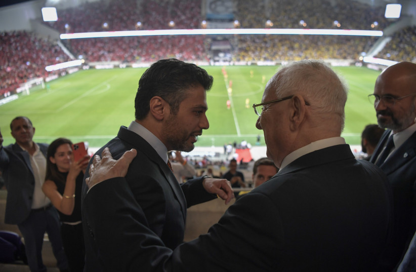  SPORT LOVER: With then-president  Reuven Rivlin ahead of the awarding  of the 2020–2021 Israel State Cup,  at Bloomfield Stadium in June. (credit: Wikimedia Commons)