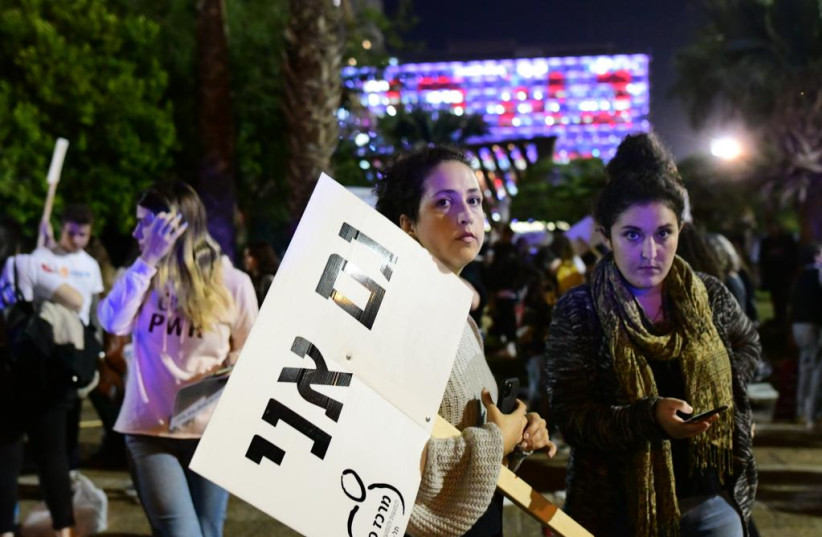 Demonstrators in Tel Aviv protest against violence against women at a rally marking the International Day for the Elimination of Violence against Women on November 25, 2021 . (photo credit: AVSHALOM SASSONI/MAARIV)