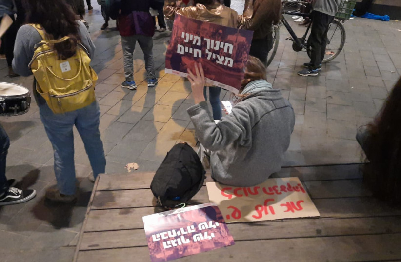  A sign at Jerusalem's Zion Square reading ''Sexual education saves lives,'' on International Day for the Elimination of Violence against Women, Thursday, November 25, 2021. (credit: EVE YOUNG)