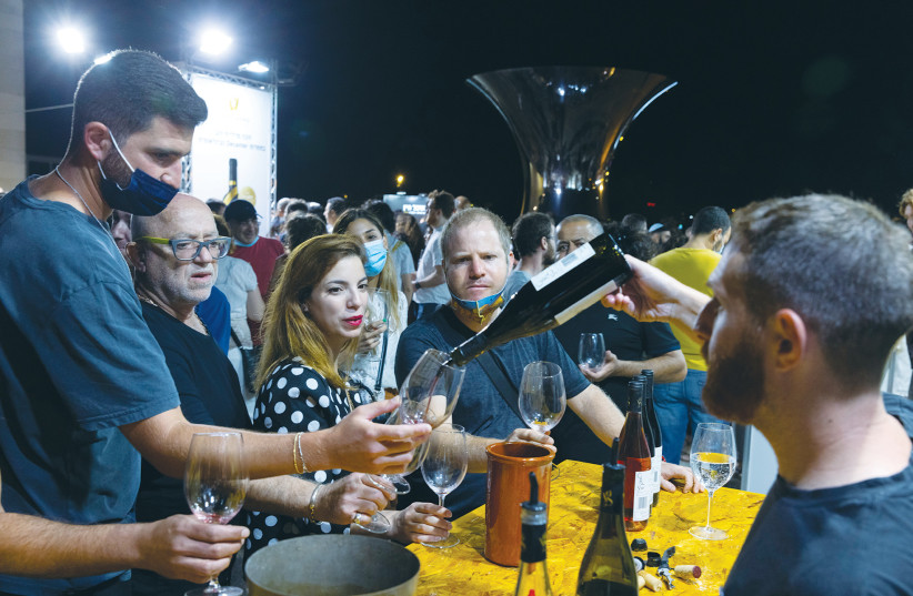  THE WINE FESTIVAL at the Israel Museum. ‘Over the past century, the Land of Israel has awakened, giving forth fruit to its indigenous people, the Jewish people, as it returns to and renews its ancient homeland.’ (photo credit: OLIVIER FITOUSSI/FLASH90)