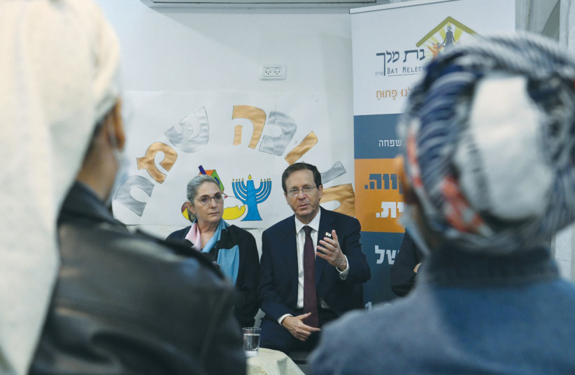  PRESIDENT ISAAC Herzog and his wife Michal visit a Bat Melech shelter for women in distress, on Wednesday, to mark International Day for the Elimination of Violence against Women. (photo credit: AMOS BEN-GERSHOM/GPO)