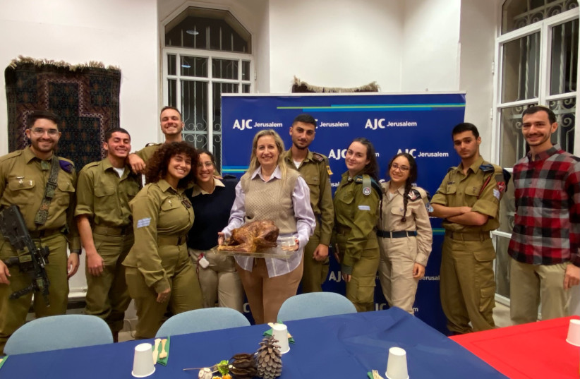  The Thanksgiving dinner for American IDF lone soldiers, hosted by AJC Jersualem (credit: AJC JERUSALEM)
