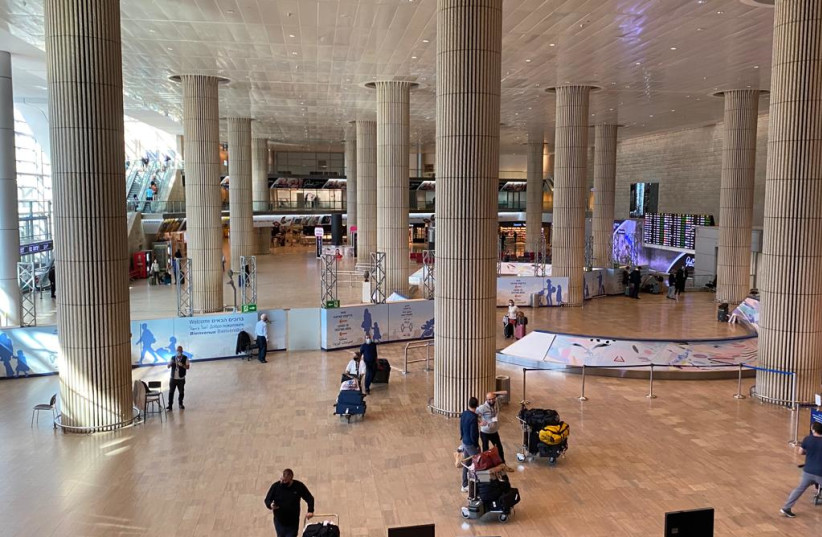  The nearly empty arrivals hall after the government barred tourists from entering the country, on November 28, 2021.  (photo credit: AVSHALOM SASSONI/MAARIV)
