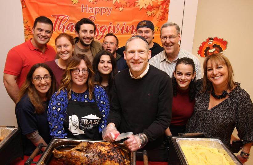 Co-Founder of Nefesh B’Nefesh, Rabbi Yehoshua Fass and Michael Levine Base Co-Founders, Bonnie Rosenbaum and Lizzie Noach at Thanksgiving Dinner. (photo credit: YONIT SCHILLER)