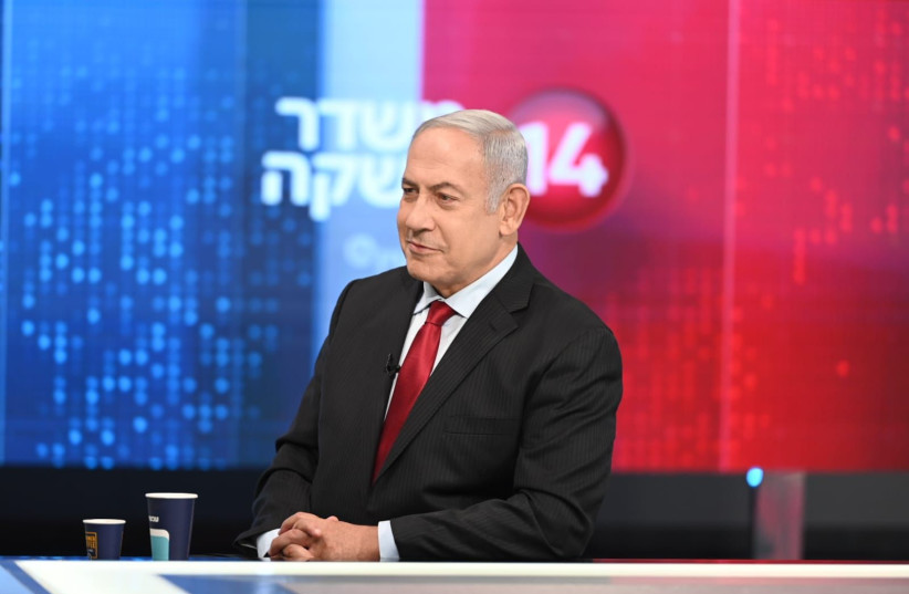  Opposition head Benjamin Netanyahu at the opening broadcast of Channel 14, November 27, 2021. (photo credit: MEIR ELIPOUR)