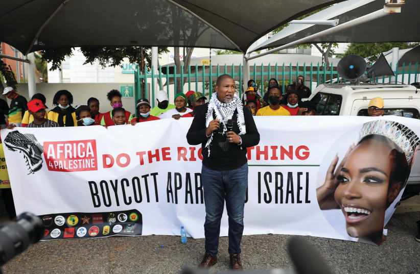  NELSON MANDELA’S eldest grandson, Mandla Mandela, speaks during a protest by Palestinian supporters earlier this month in Johannesburg, calling for Miss South Africa Lalela Mswane to withdraw from the Miss Universe pageant in Israel.  (photo credit: SIPHIWE SIBEKO/REUTERS)