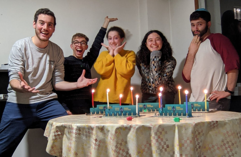 Recipients enjoying their RCE Menorah's this Hanukkah. (credit: Courtesy)