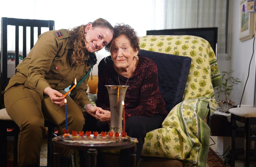  Naomi Yakobovich and her granddaughter Doron, an officer in the IDF.  (photo credit: IDF SPOKESPERSON'S UNIT)