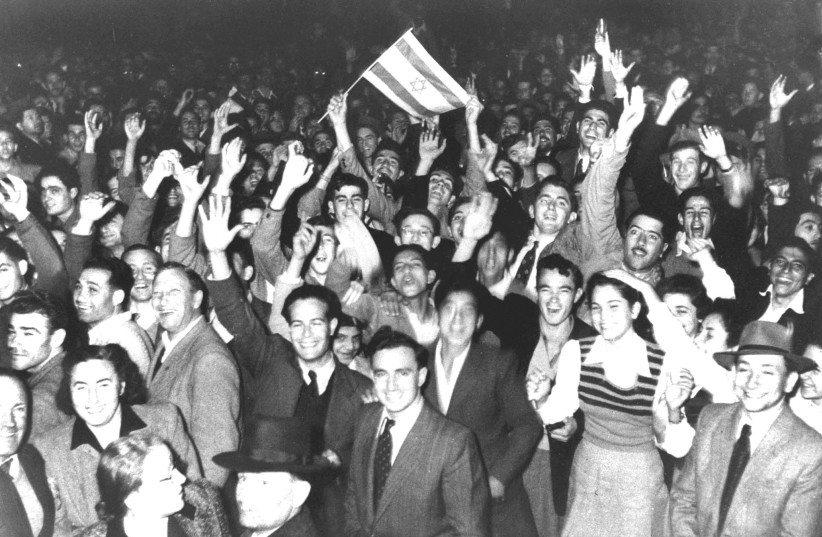  JEWS CELEBRATE in the streets of Tel Aviv moments after the United Nations voted on November 29, 1947 to partition Palestine into two states. (credit: REUTERS)