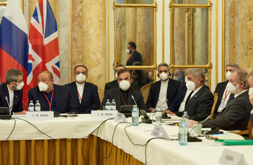  Iran's chief nuclear negotiator Ali Bagheri Kani and members of the Iranian delegation wait for the start of a meeting of the JCPOA Joint Commission in Vienna, Austria November 29, 2021. (photo credit: EU DELEGATION IN VIENNA/HANDOUT VIA REUTERS)