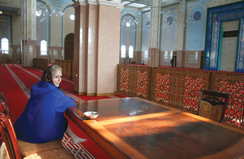  Netty Gross in a mosque in Kazakhstan in 2010. (photo credit: Courtesy)