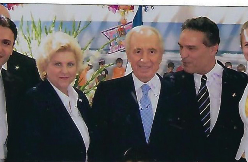 Dr. Daniel Dana and PLIM representatives meeting Shimon Peres. (credit: Courtesy)