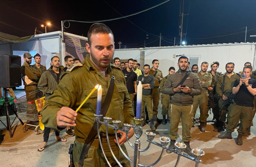 The 97th Netzah Yehuda Battalion's Hanukkah candle-lighting (credit: NETZAH YEHUDA FOUNDATION)