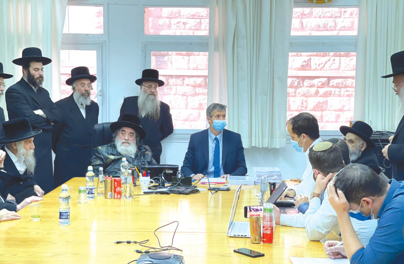  COMMUNICATIONS MINISTER Yoaz Hendel heads a meeting with the Vizhnitz Rebbe and other haredi rabbis this week at his office. (credit: Courtesy)