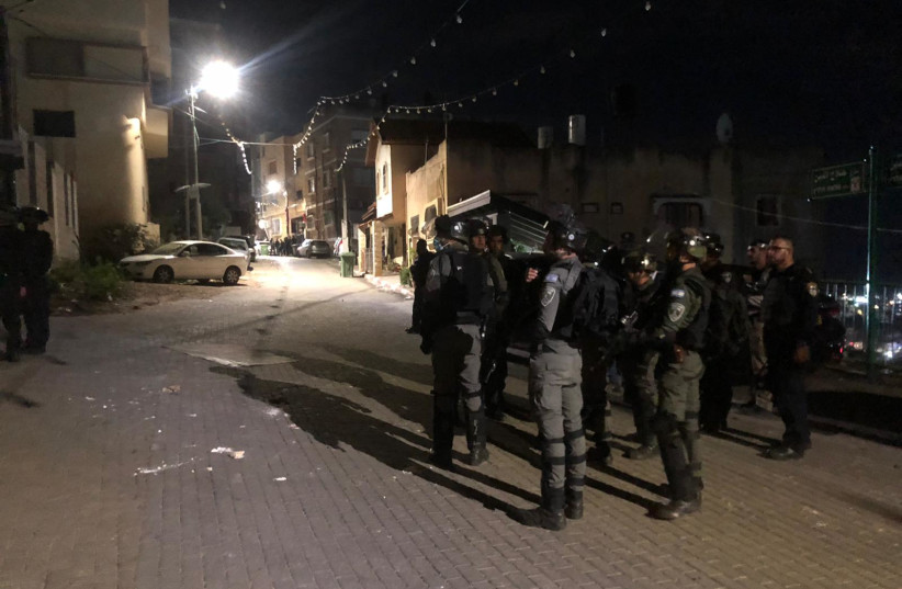  Israeli security forces in Umm al-Fahm to quell riots after a murder took place in the city on Thursday, November 2, 2021.  (credit: ISRAEL POLICE)