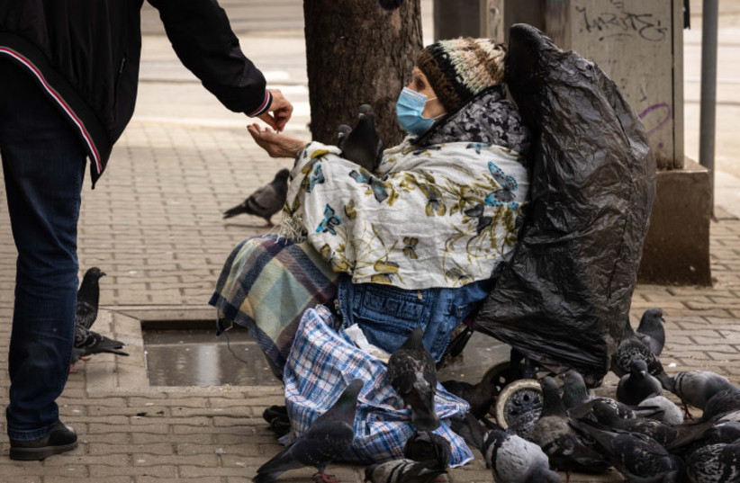  A homeless woman (credit: NATI SHOHAT/FLASH90)