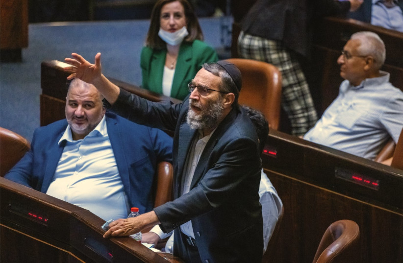  MK MOSHE GAFNI rises to voice an objection in the Knesset plenum. (photo credit: OLIVIER FITOUSSI/FLASH90)